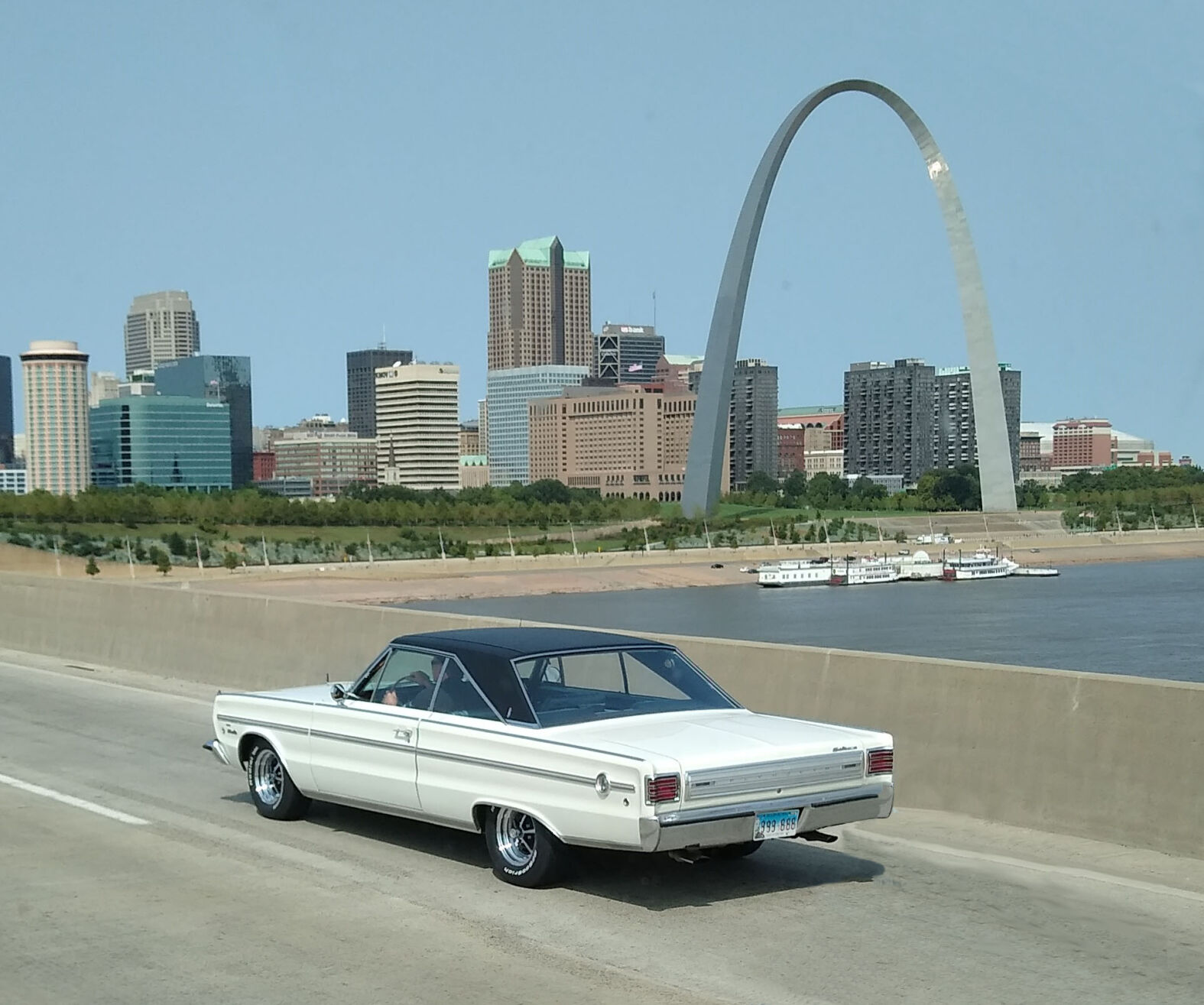 We spotted this exceptionally clean, 1966 Plymouth Satellite recently heading westbound across the river to St. Louis. Aside from the custom mag wheels, there is something odd about this car. Can you spot it?